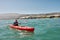 Young man in sea kayak