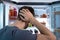 Young Man Searching For Food In Refrigerator