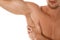 Young man showing hairy armpit on white background. Epilation procedure