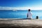 Young man siting on pier