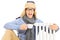 Young man sitting next to radiator holding cup of hot tea