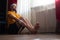 Young man sitting in paschimottanasana or Intense Dorsal Stretch pose