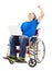 Young man sitting on a wheelchair and excited to raise arm