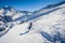 Young man skiing in alps mountains on sunny day - Skier training during winter