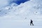 Young man skiing in the Retezat Mountains in a beautiful sunny day.