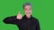 Young man smile showing likes on green screen. Gay with color hair