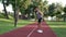 young man sportsman doing burpee exercise in park outdoor, burpee