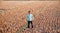 Young man standing in a field unique photo