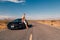 Young man standing by the Ford Mustang GT