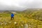 Young man standing on the mountain