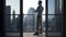 Young Man Succeed In High Rise Apartment Looking at Urban Buildings