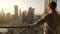 Young Man Succeed In High Rise Apartment Looking at Urban Buildings