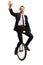 Young man in a suit riding a unicycle and waving at the camera