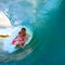 Young man surfing