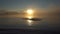 Young man swims craws in a lake at sunset in slo-mo