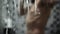 Young man taking in the bathroom shower view through a mirror with a blurred background