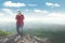 Young man taking photo on mountain