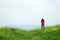 Young man taking photos in Tuscany