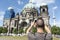 Young man taking a picture of the Berlin Cathedral