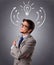 Young man thinking with arrows and light bulb overhead