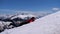 Young Man on the Top of the Alpine Mountains Jumps and Rejoices the Goal. Switzerland