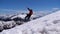 Young Man on the Top of the Alpine Mountains Jumps and Rejoices the Goal. Switzerland