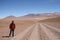Young man tourist in Atacama Desert in Bolivia