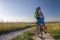 Young man traveling on bicycle in morning sunrise with wonderful