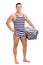 Young man in underwear holding a laundry basket
