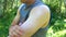 A young man uses a cream from mosquitoes.