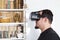 young man using virtual reality headset