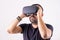 Young man using VR glasses headset holding with hands, portrait. Virtual reality, future technology, education video