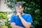 Young man vaping outdoors closeup