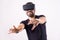 Young man in VR glasses headset gesturing portrait. Virtual reality, future technology, education video gaming