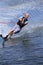 A young man water skiing