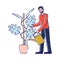 Young Man Watering and Planting Flower. Gardener or Florist Working in Botanical Garden or Home Backyard Terrace