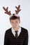 Young man wearing deer\'s horns