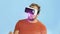 Young man wearing VR virtual reality googles