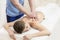 Young man wellness treatments sports massage