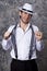 Young man in a white shirt and cowboy hat