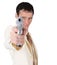 Young man in white suit with pistol