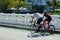 Young Man and Woman Bicycling on the Venetia Causeway in Miami Beach