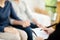 Young man and woman consulting with professional consultant.