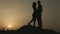 Young man and woman in love hugging passionately, kissing. Romantic feelings