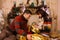 Young man and woman opening Christmas gifts