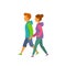 Young man and woman walking holding hands side view