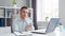 Young Man Works while Sitting in front of a Computer at Home. The Workplace of a Professional Worker, Freelancer or