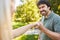 Young man and young woman greet each other with fist bump