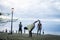 Young men exercising martial arts on beach