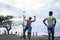 Young men exercising martial arts on beach